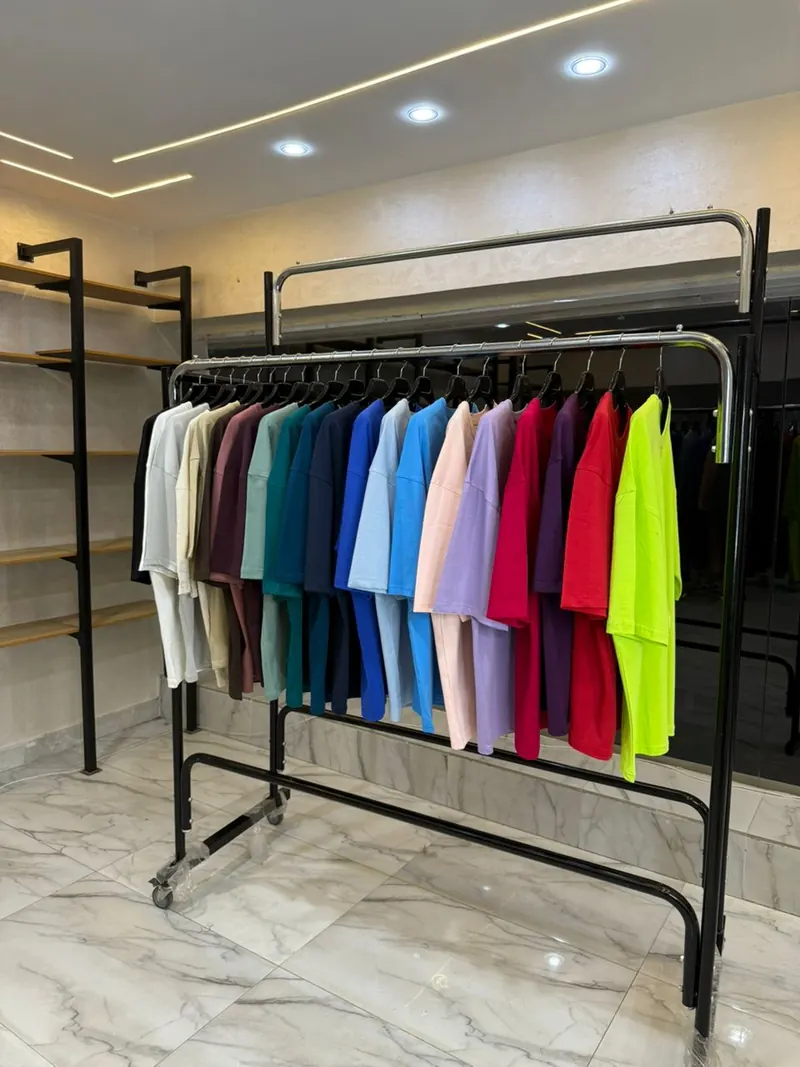 Rail of garments in a wide range of colours