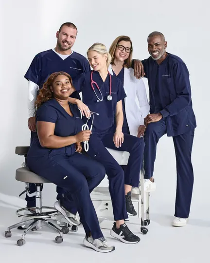 Healthcare team in navy scrubs