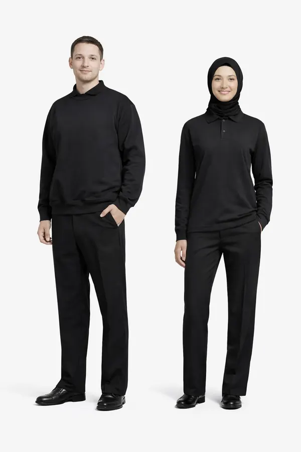 Man and woman in matching black long-sleeve tops and trousers