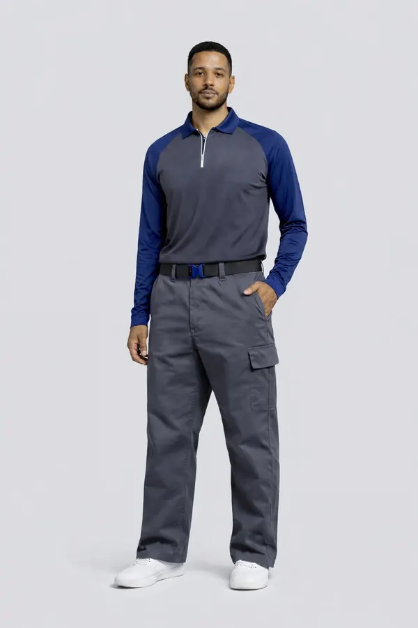 Man in a navy and royal-blue raglan work top with grey cargo trousers